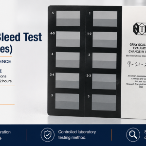 DuPont Spot Bleed laboratory test showing the AATCC Gray Scale used to evaluate carpet dye migration and color bleeding after prolonged wet exposure.